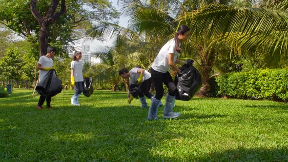 Volunteers Collecting Household Waste