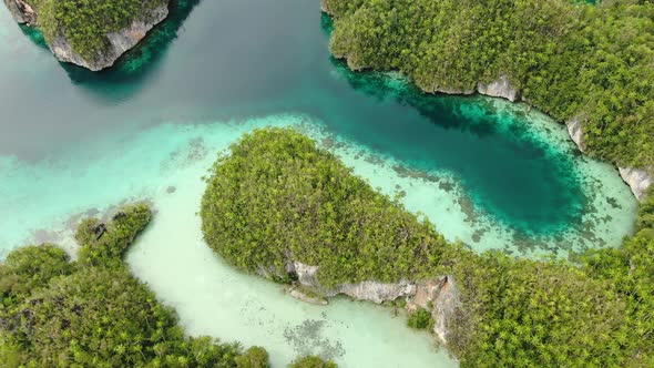 Triton Bay With Turquoise Sea And Green Tropical Trees In Kaimana Islands. 