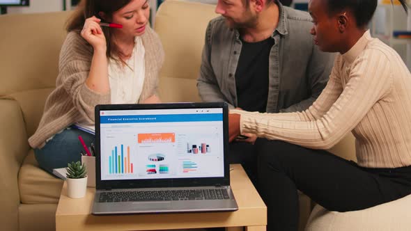 Diverse Colleagues Employees Cooperating in Office Discussing at Workplace