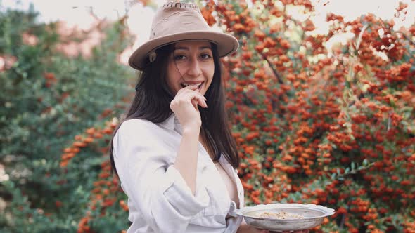 Woman Eats Walnut Paste