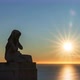 Statue of a Women Praying at Sunrise - VideoHive Item for Sale