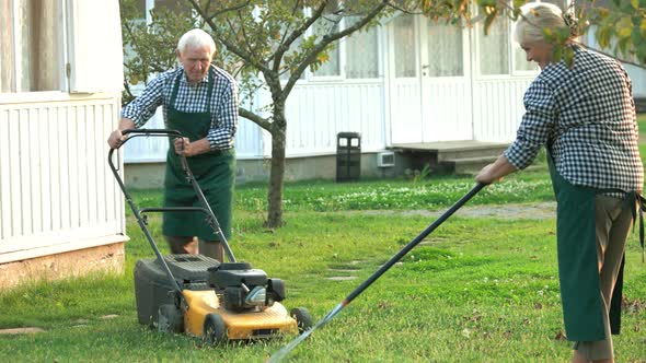 Couple of Senior Gardeners Working.