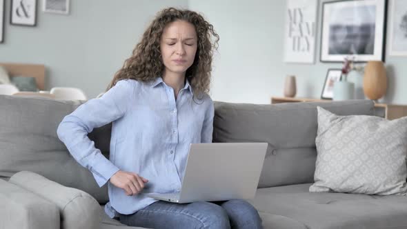 Spinal Back Pain While Curly Hair Woman Working in Creative Office