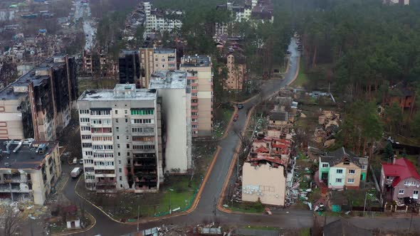 Aerial view of the destroyed and burnt houses. Houses were destroyed by rockets. alt