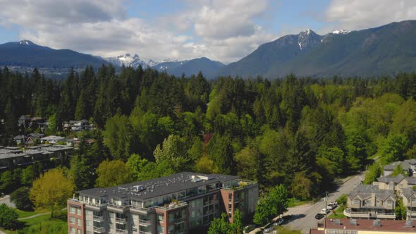 Picturesque aerial view of a mountainside community in beautiful North Vancouver, Canada.