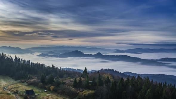 Sunrise with flowing clouds in the Tatra mountains, Poland, Timelapse