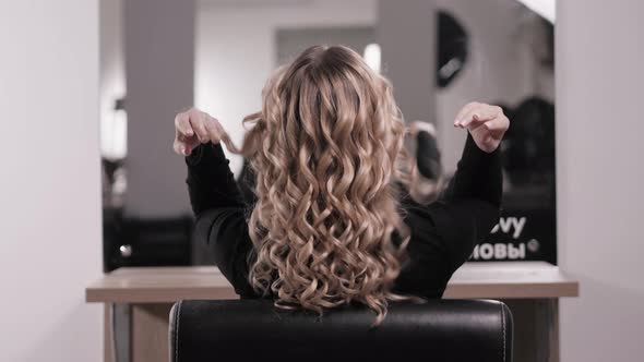 The Blonde Shows Off Her Hairstyled Curled Curls