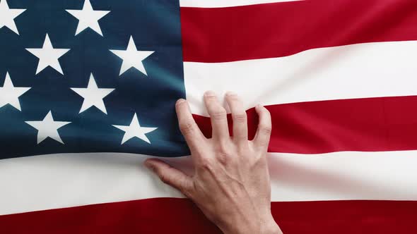 Hand on American Flag Close Up