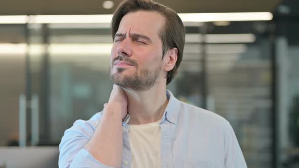 Tired Mature Adult Man Having Neck Pain