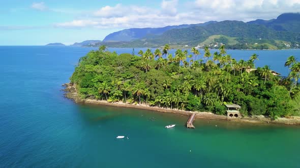 Drone view of a small islet near the north coast of the State of São Paulo, Brazil