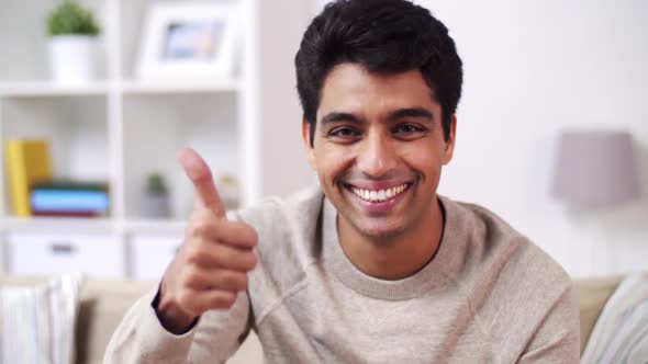 Portrait of Happy Smiling Young Indian Man at Home 66