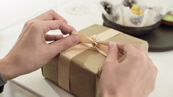 Person Unpacking Present