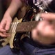 Closeup Playing the Guitar Frame of Hands Playing the Strings - VideoHive Item for Sale