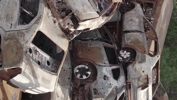 Vertical Video of a Dump of Destroyed Cars During the War in Ukraine