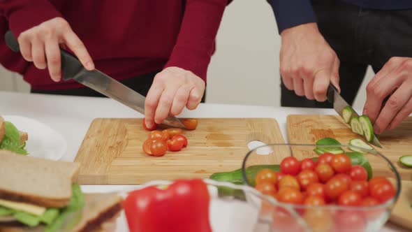 Cutting Cherry Tomatoes and Cucumber