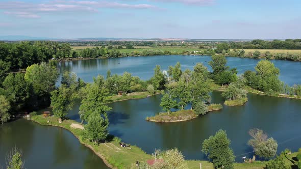 Aerial view of a natural swimming pool in the town of Surany in Slovakia