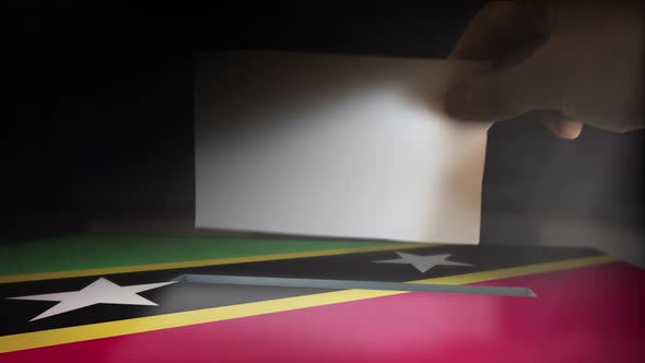 Digital Composite Hand Voting To National Flag OF Saint Kitts and Nevis alt