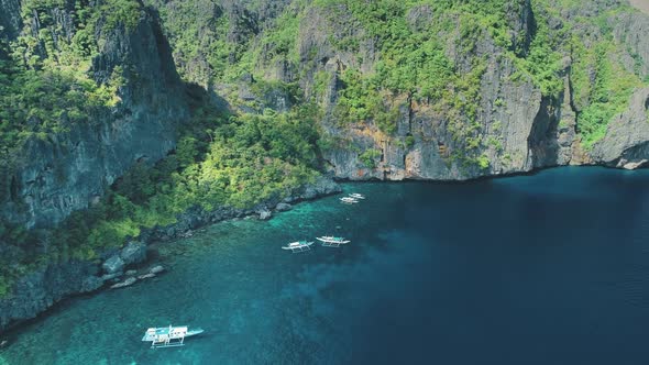 Passenger Boats at Rock Ocean Shore Aerial View