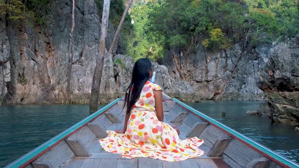 Khao Sok Thailand Woman on Vacation in Thailand Girl in Longtail Boat at the Khao Sok National Park