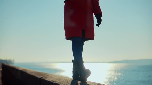Stylish Woman Legs In Winter Boots Walking On Vacation Holiday In Cold Winter Day.