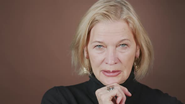 Studio Portrait of Successful Mature Woman