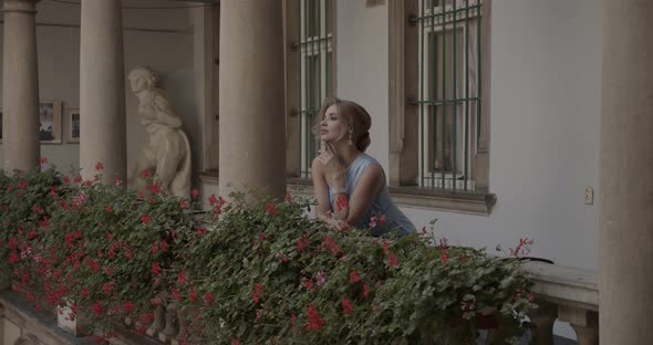 Charming Girl In A Festive Dress Enchants With Her Look