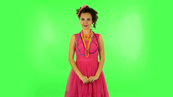 Woman Talking and Pointing Side Hand for Something, with Copy Space. Green Screen