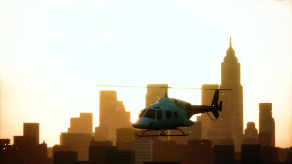 Silhouette Helicopter at City Scape Background