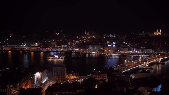 Aerial View of Boat Floating on Golden Horn Waterway at Night Time