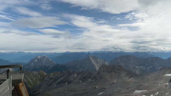 Fast moving clouds over Alps mountain range, timelapse from Zugspitze