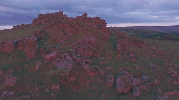 Famous english landscape in Dartmoor National Park at sunrise, Devon, England, UK. Aerial drone view