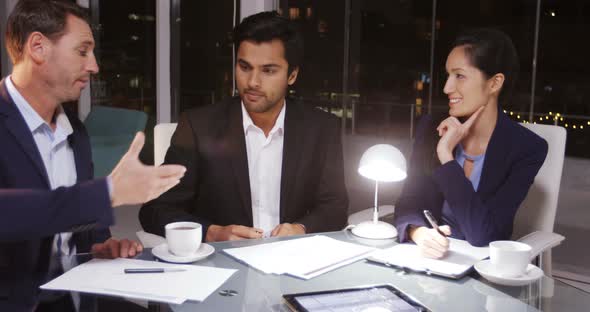 Business people shaking hands in office