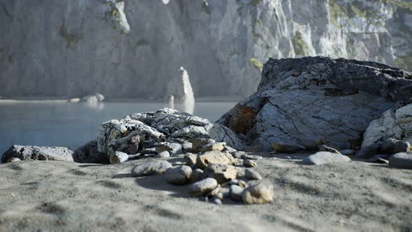 Sand Beach Among Rocks at Atlantic Ocean Coast in Portugal
