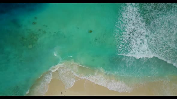 Aerial top down tourism of paradise island beach vacation by blue ocean and white sand background of