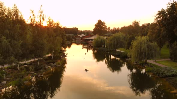 Aerial Landscape of Park Pond and Sunset Shine