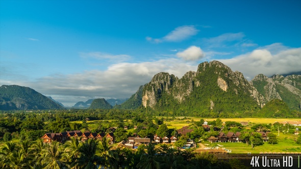 4K Time-Lapse of the Scenic Limestone Cliffs Countryside in Vang Vieng, Laos