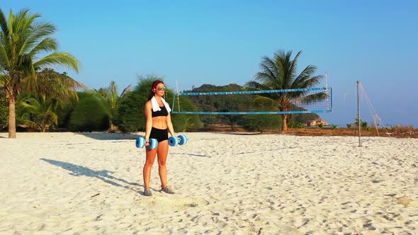 Modern Smiling Girls Traveling by The Sea on Beach on Clean White Sand and Blue