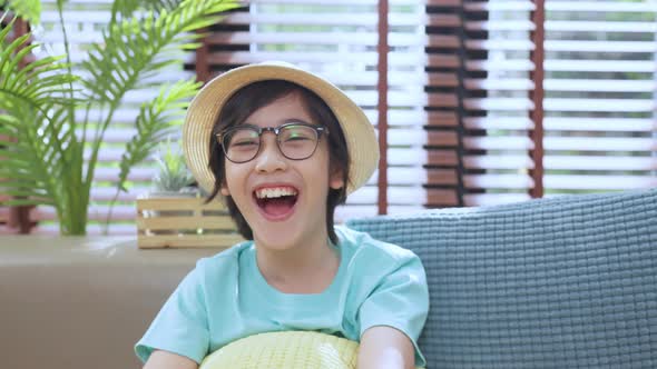 happiness asian child boy greeting hand wave to say hi  video portrait