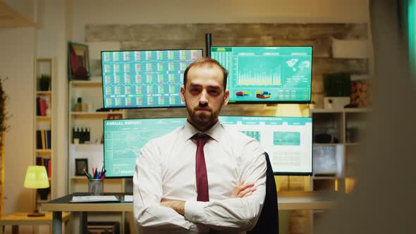 Portrait of Stock Market Broker Looking Serious at the Camera