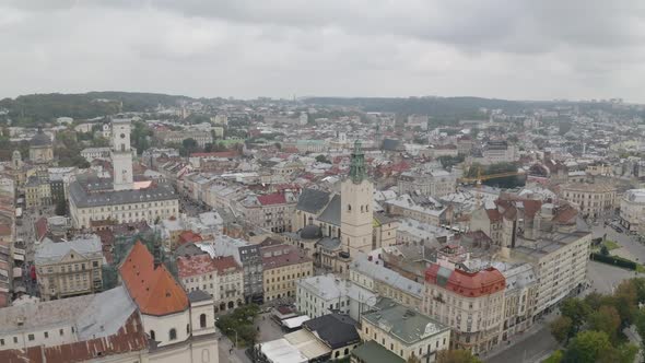 Aerial Drone Video of European City Lviv Ukraine Rynok Square Central Town Hall Dominican Church