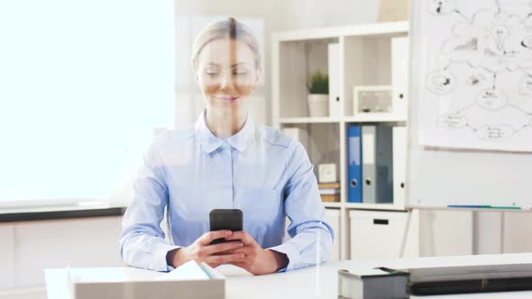 Businesswoman with Smartphone Working at Office 29