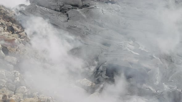 Smoke Swirling From Volcanic Rock Of Lava Field