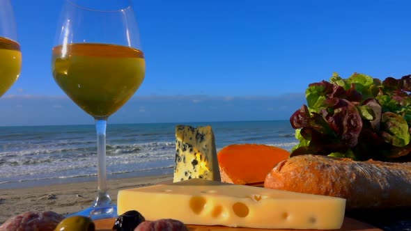 Romantic Picnic By the Sea with White Wine, Cheese