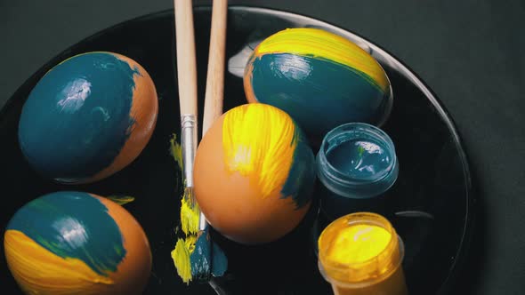 Painted YellowBlue Easter Eggs are Spinning