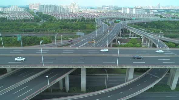 Aerial Drone View of Highway Multilevel Junction Road with Moving Cars at Daytime