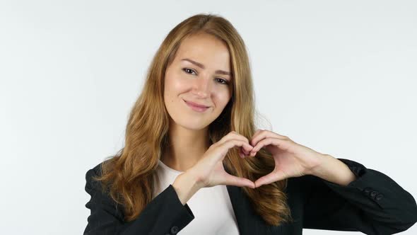 Businesswoman Making Heart With Hands , Peace ,White background
