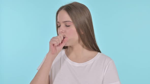 Sick Beautiful Young Woman Coughing, Blue Background