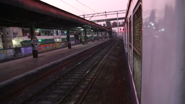 View from train to railway station during ride.