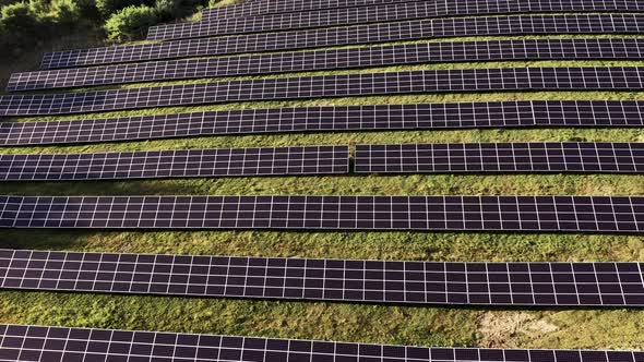 aerial view of solar power station, Aerial Top View of Solar Farm with Sunlight, 