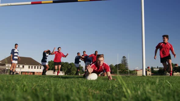 Rugby players having match on the field